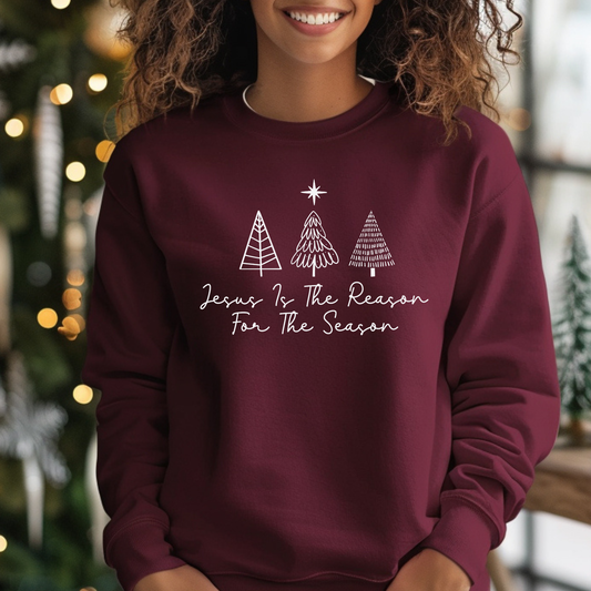 Jesus is the Reason for the Season maroon sweatshirt with hand-drawn Christmas tree doodles