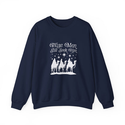Navy blue sweatshirt with 'Wise Men Still Seek Him' text and nativity scene graphic on a white background